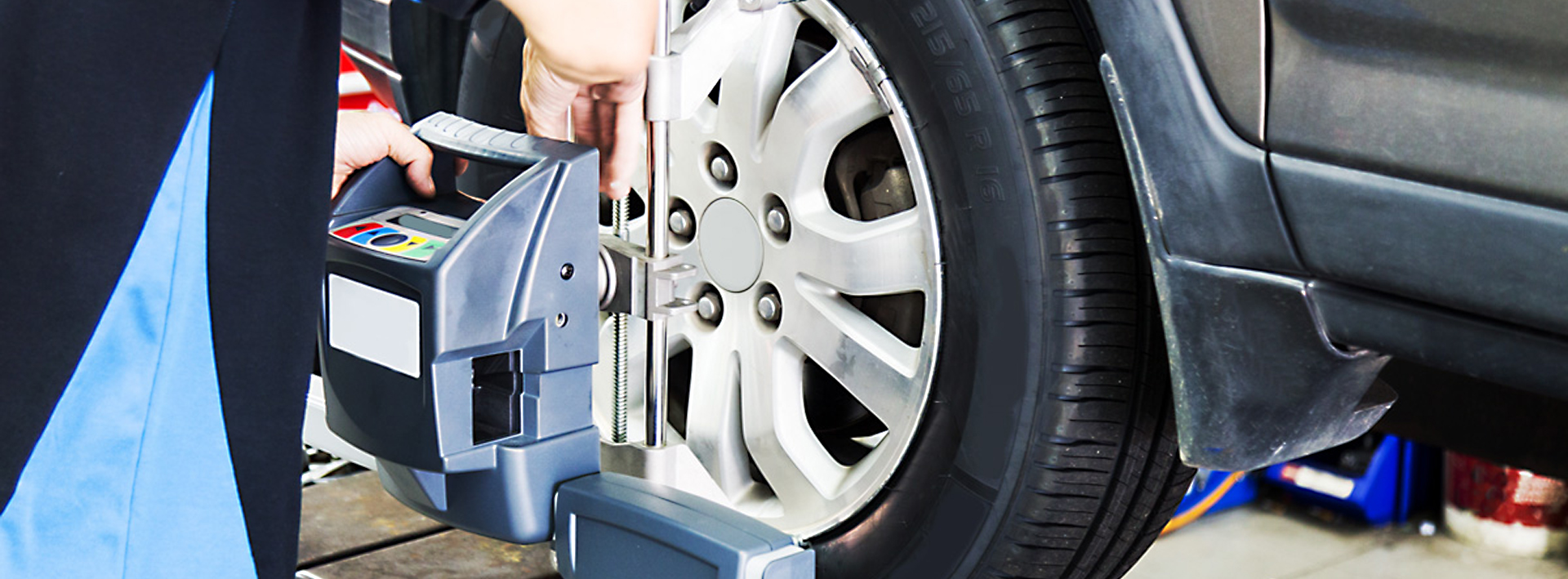 A vehicles wheels being alinged - Wheel Alignment Knowsley